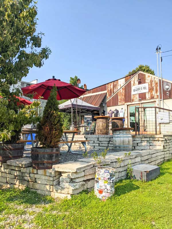 Exterior of Burial Beer in Asheville's South Slope brewery district on a sunny day