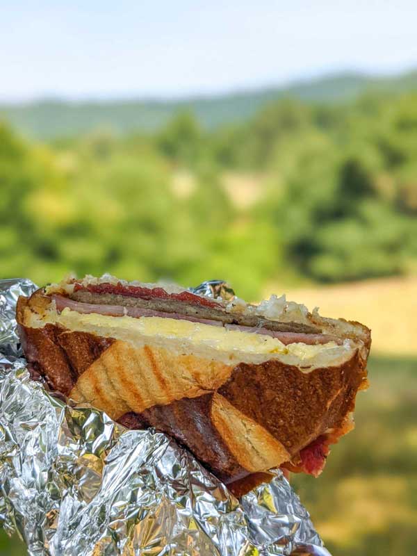 Mosaic Cafe's lumberjack breakfast sandwich on a pretzel roll