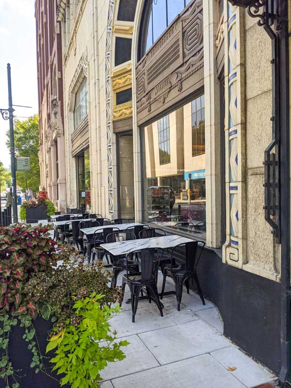 Outdoor seating on Patton Ave in front of the S& Market