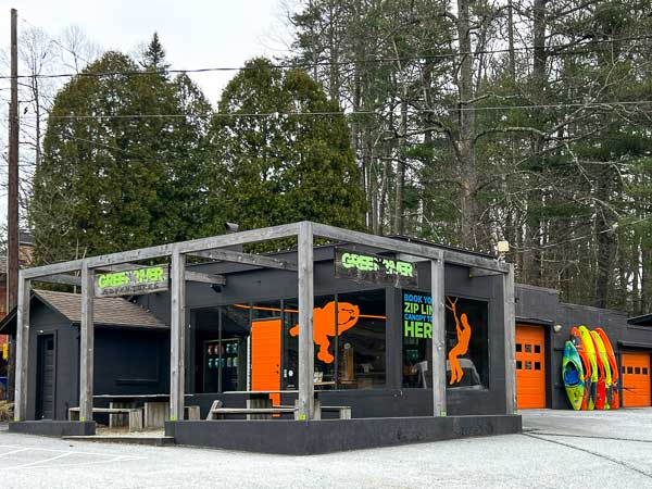 Exterior of Green River Adventure in Saluda, NC with kayaks to the side