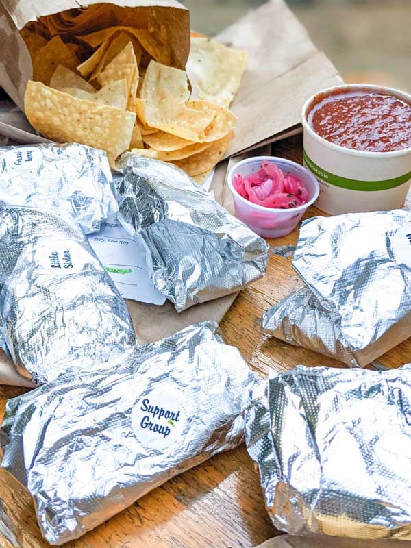 Tacos in foil and chips + salsa from West Ashevillle's Taco Billy