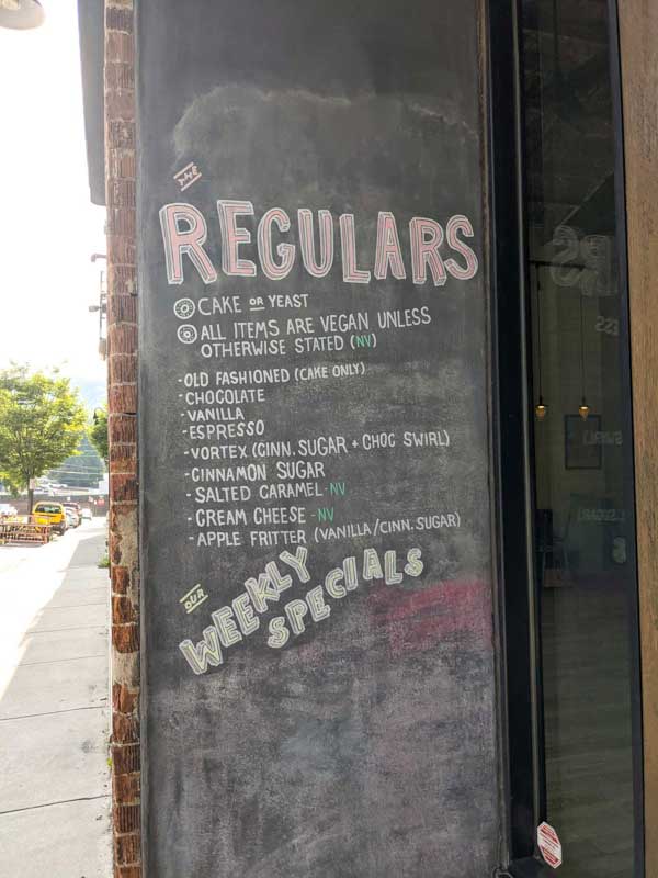 The "regulars" menu at the entrance of Vortex