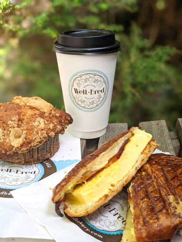 Muffin, coffee and breakfast sandwich from Well Bred in Asheville