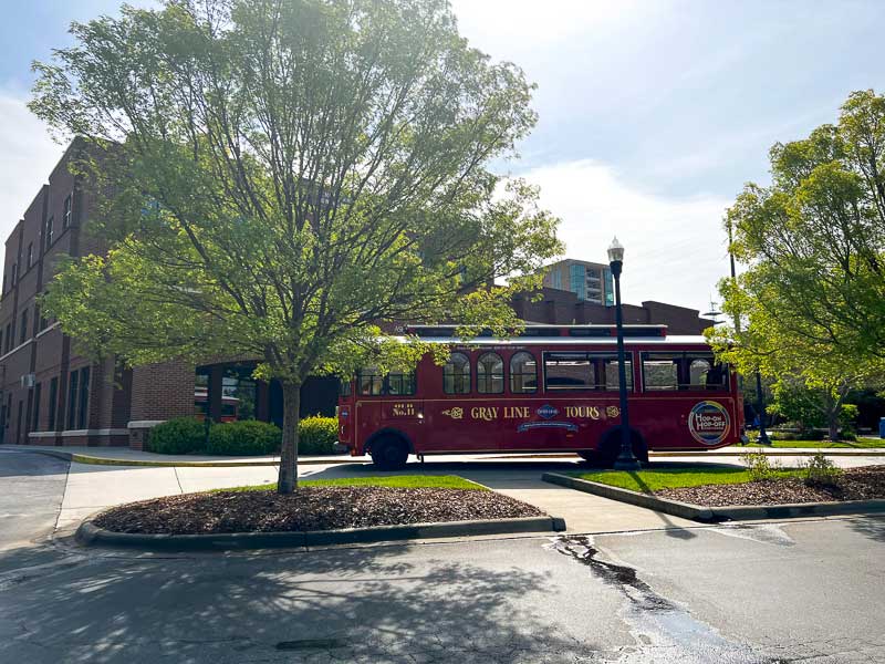 Asheville Visitor Center with a Gray Line Trolley in front