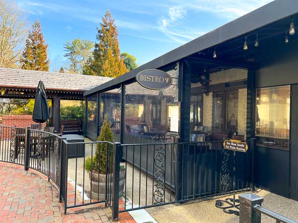 Entrance to and outdoor seating at Bistro on Biltmore Estate in Asheville