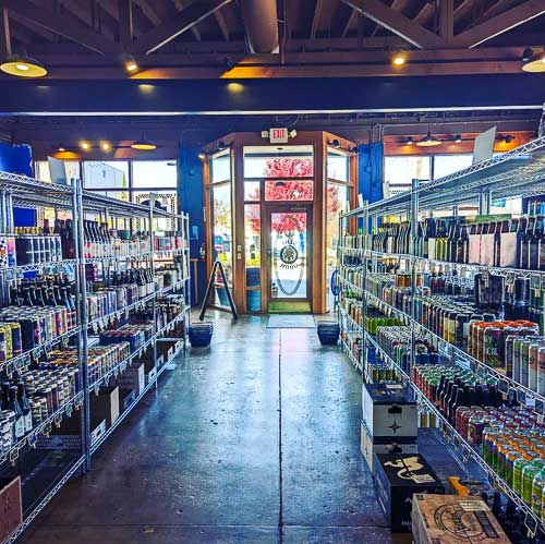 Beer shelves at the Blue Door Bottleshop in Hendersonville, NC.