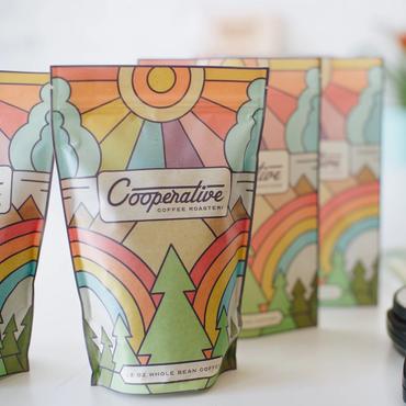 Several bags of Cooperative Coffee