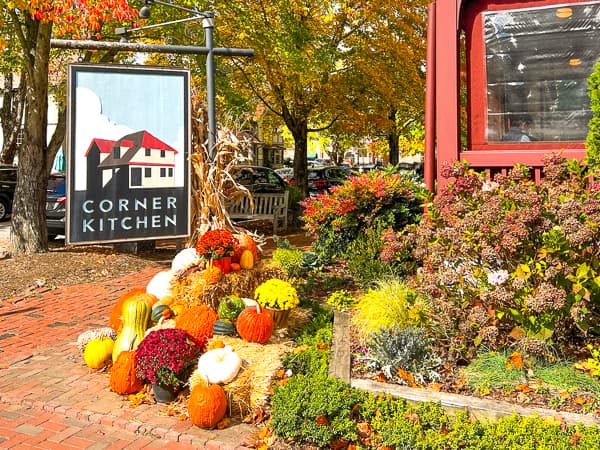 Exterior of Corner Kitchen in Biltmore Village during fall with pumpkins