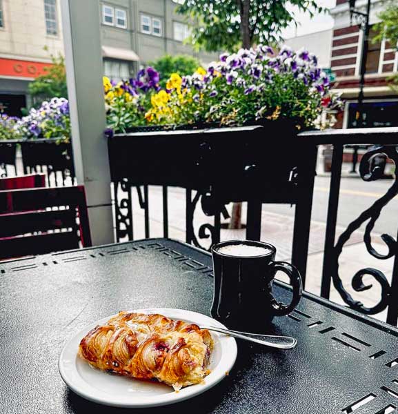 Pastry and coffee on a table at Isa's French Bistro in downtown Asheville, NC