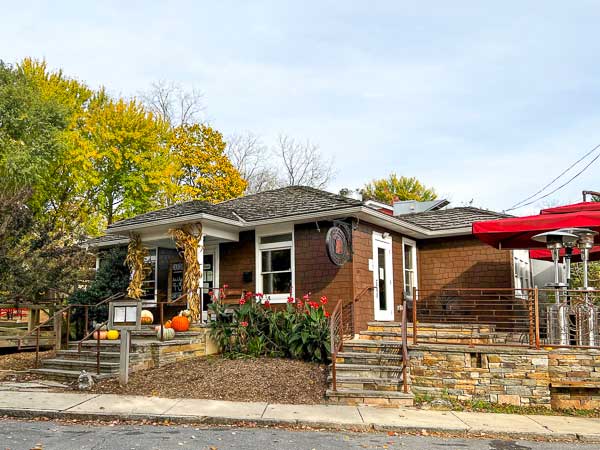 Exterior of Liberty House Cafe in North Asheville decorated for fall