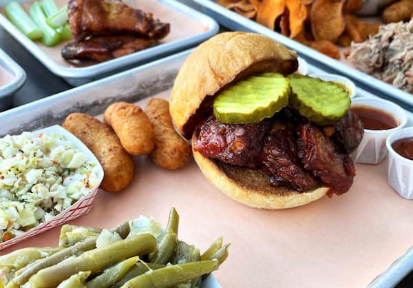 Smiling Hara BBQ Tempeh sandwich from Luella's BBQ in Asheville, NC