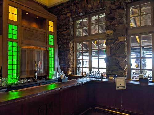 Stone wall and a bar at Omni Grove Park Inn