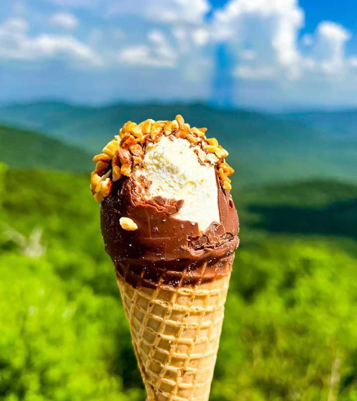 Ice cream cone in front of the view at Pisgah Inn