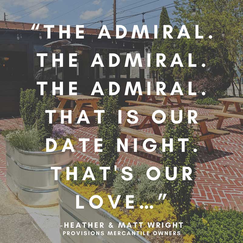 The Admiral's outdoor seating in West Asheville with a quote over it ("The Admiral. The Admiral. The Admiral. That is our date night. That's our love."