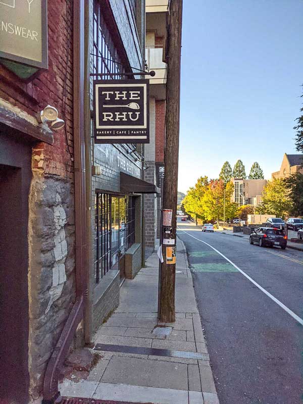 Exterior sign of The Rhu in downtown Asheville