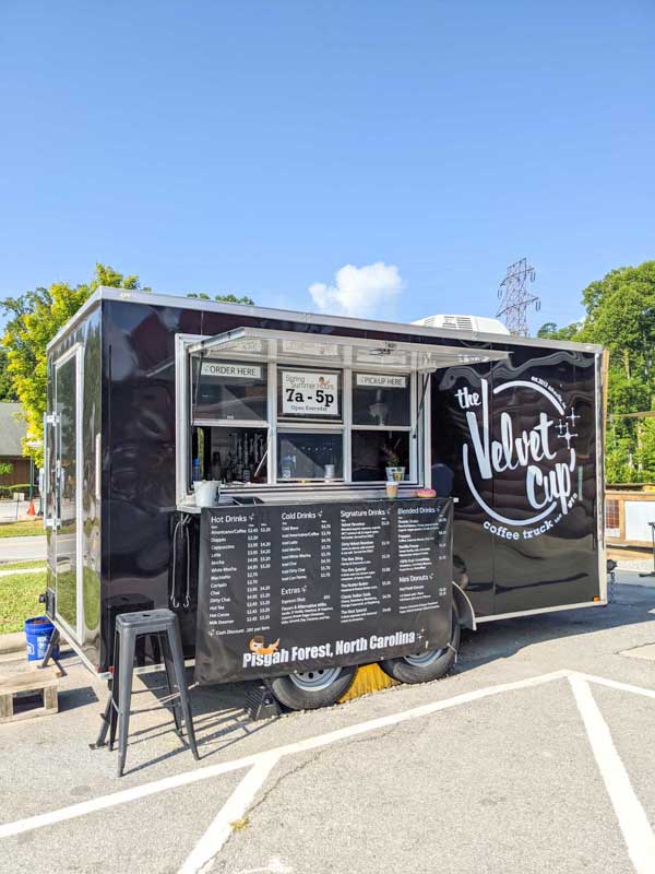 The Velvet Cup's coffee trailer parked at the entrance of Pisgah Forest